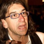 Sanremo, il ‘disturbatore’ Paolini irrompe al Tg1: “Conti bisex”. E lui risponde…