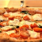 Pizza e bibita sempre più care, ecco la classifica delle 30 città più costose