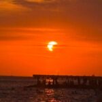 Eclissi parziale di sole, lo spettacolo al tramonto nei cieli d’Italia